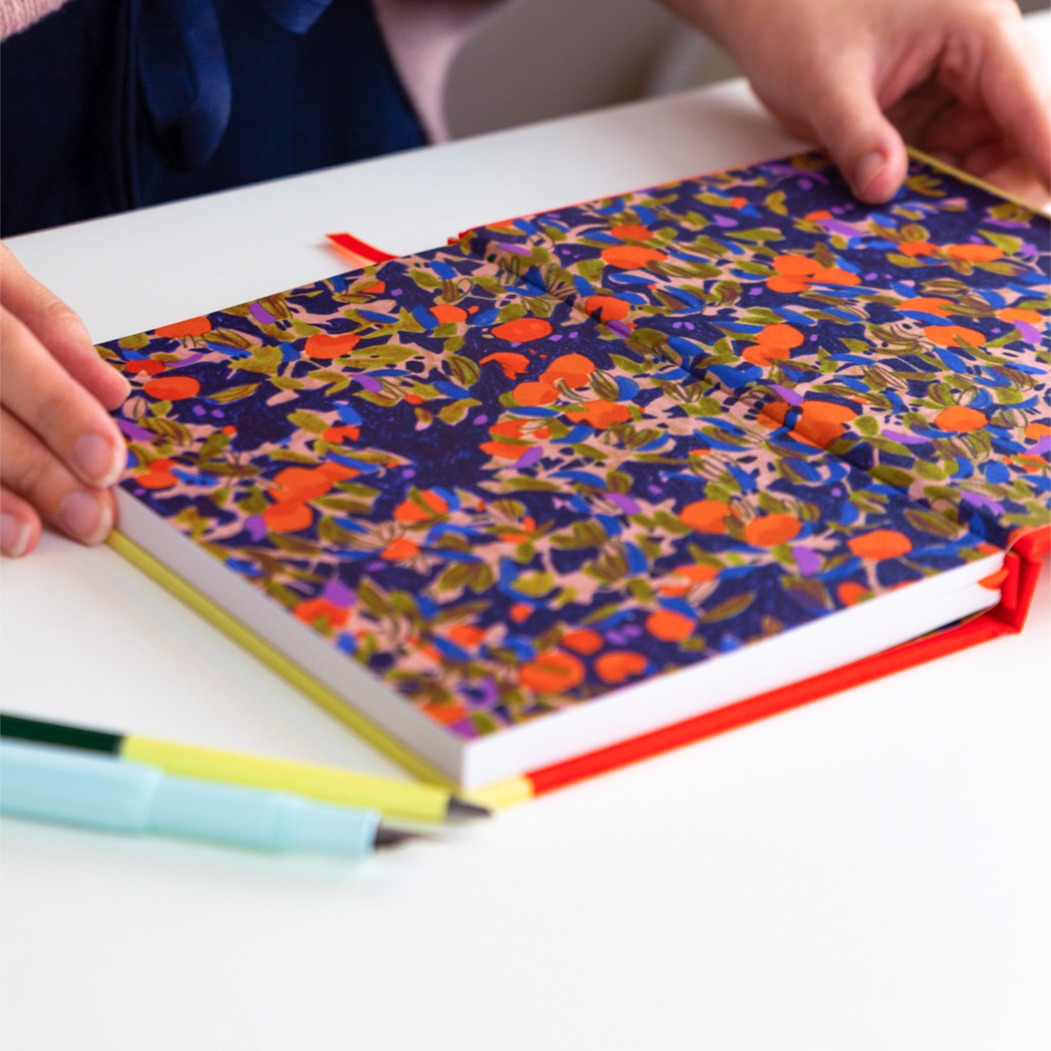 Orange pattern illustrated endpapers.