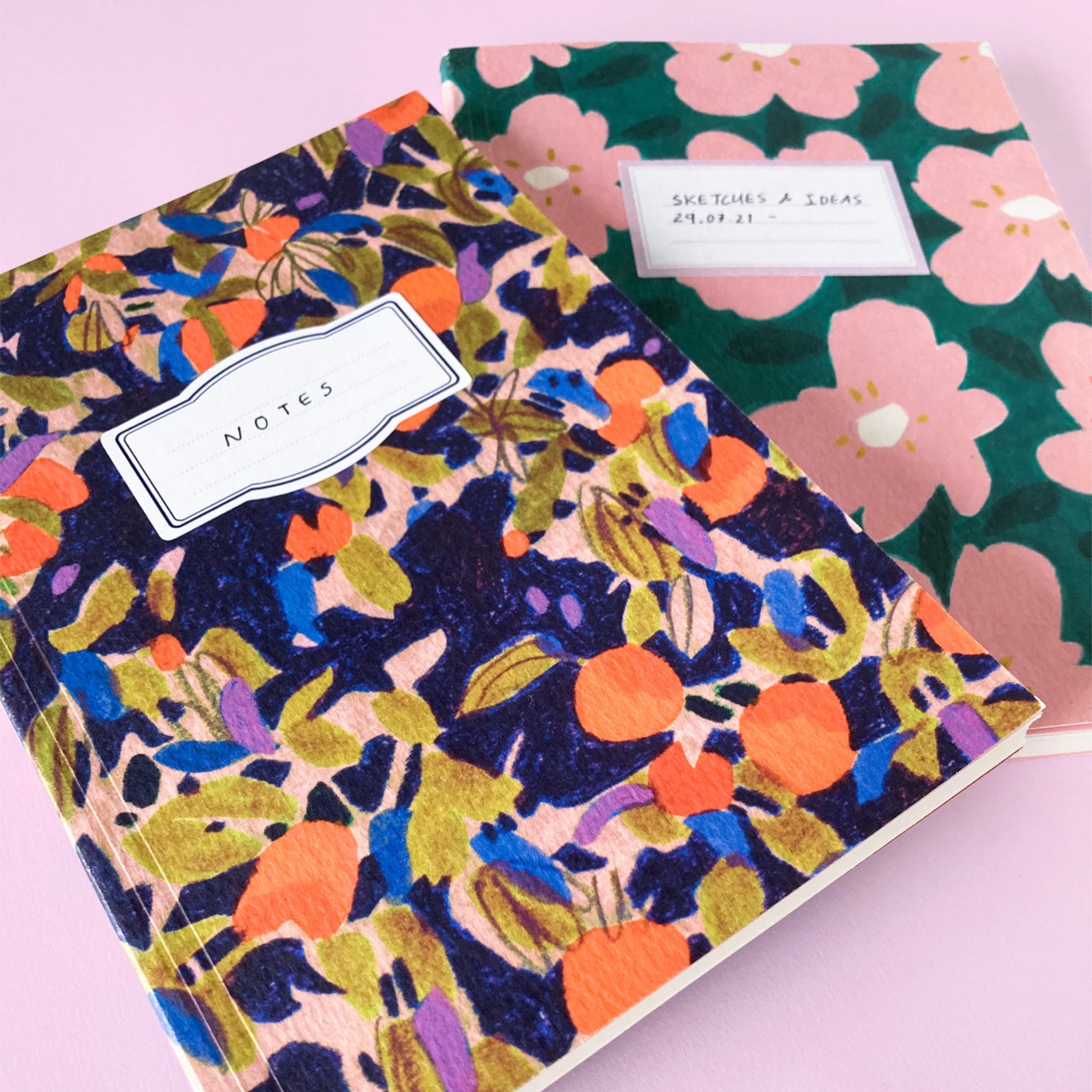 Orange and floral pattern paperback sketchbooks