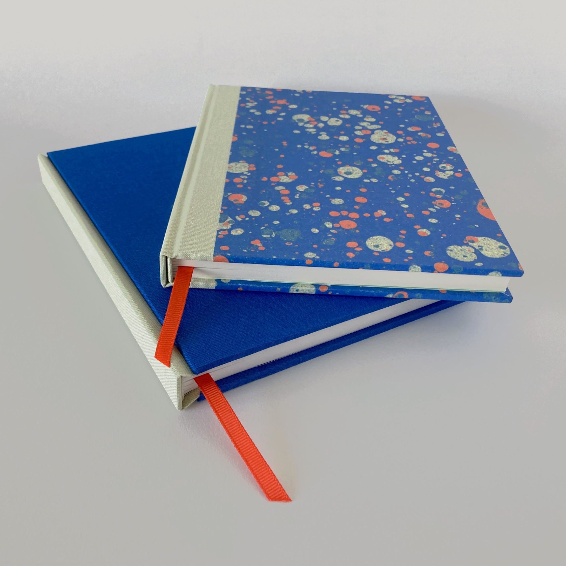 Blue marble notebook with blue and mint clothbound sketchbook.