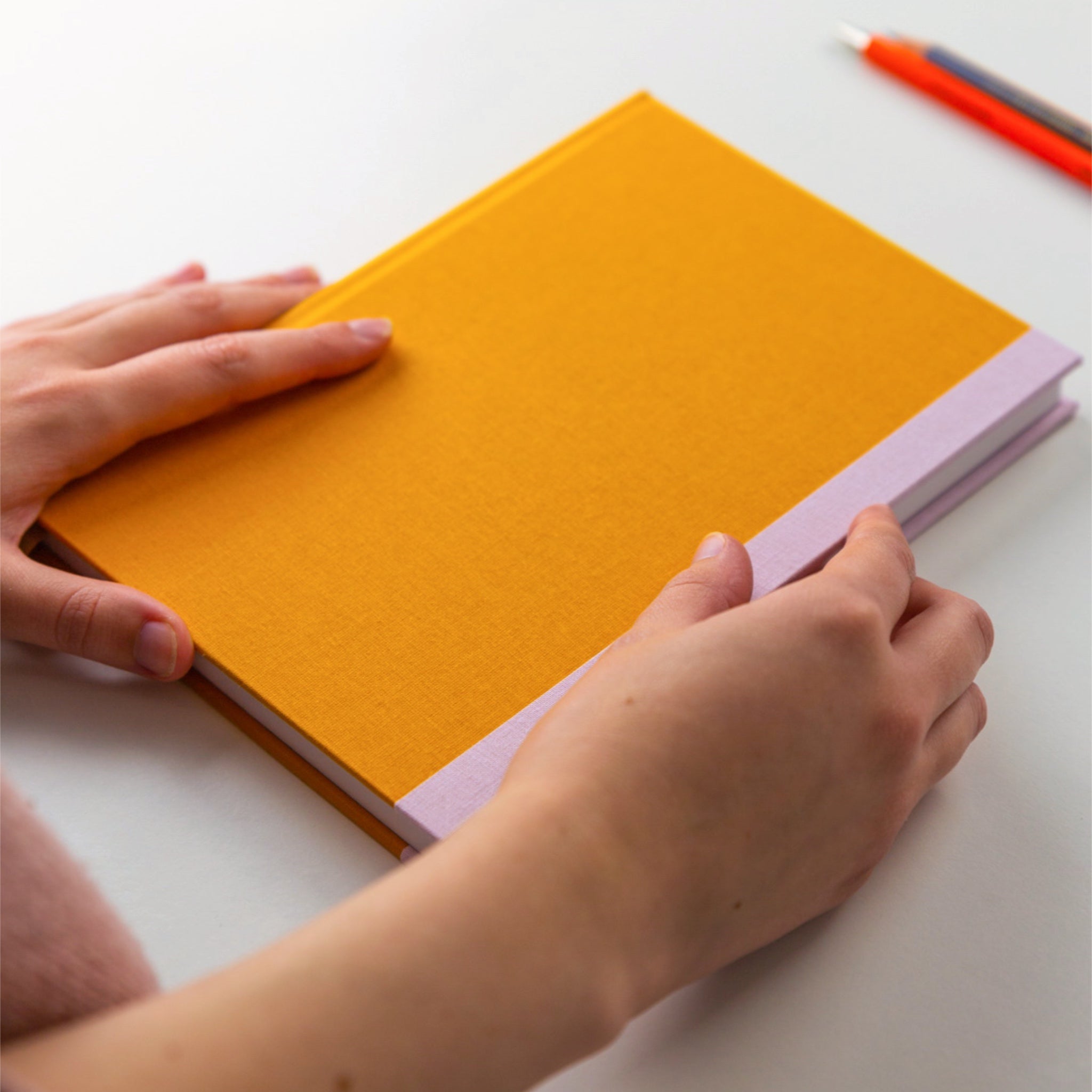 Mustard yellow fabric covered hardback sketchbook