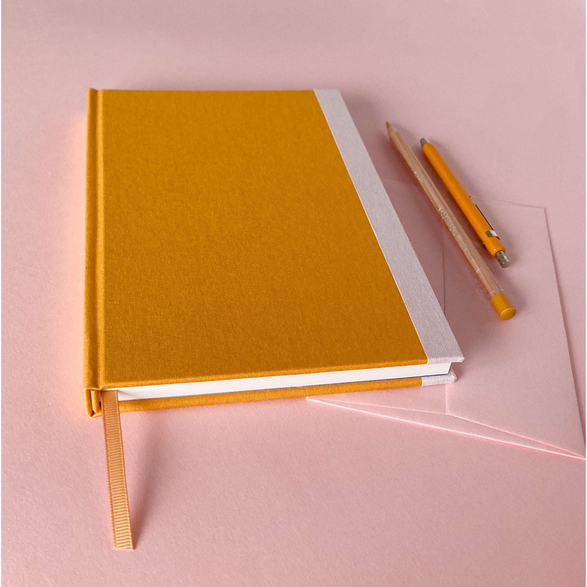 Yellow fabric hardcover sketchbook with ribbon book mark
