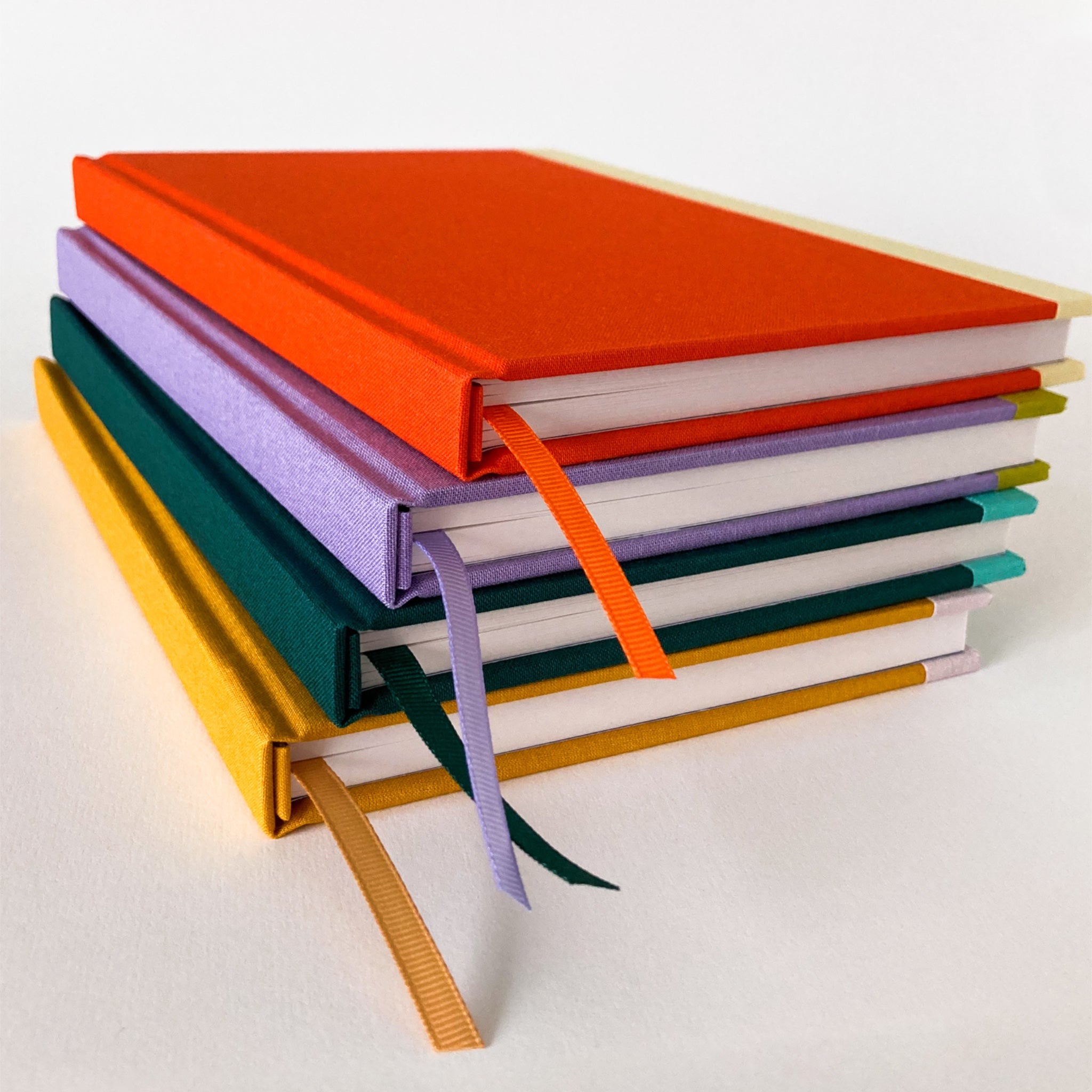 Colourful set of mixed media hardback sketchbooks