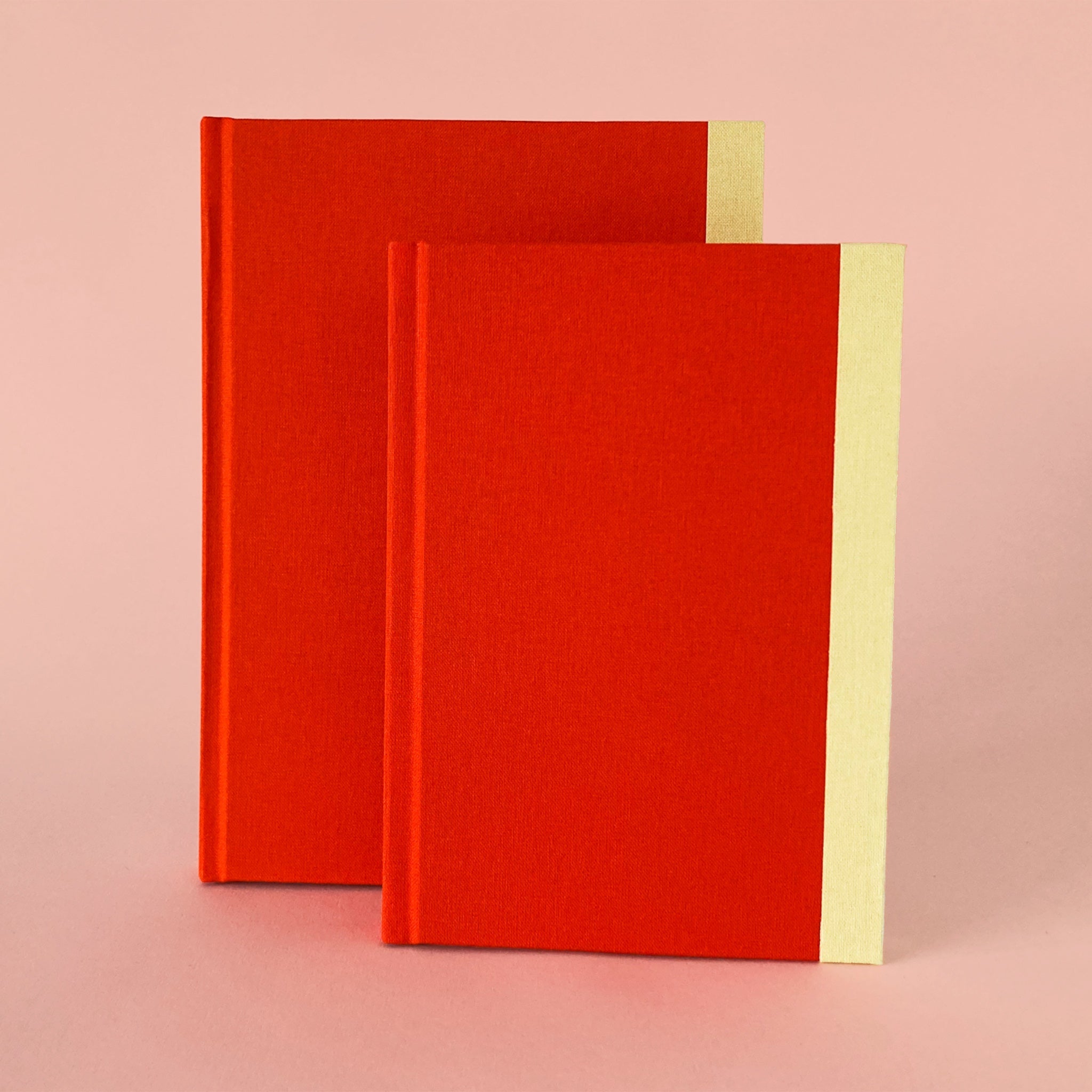 Orange clothbound hardback sketchbooks.